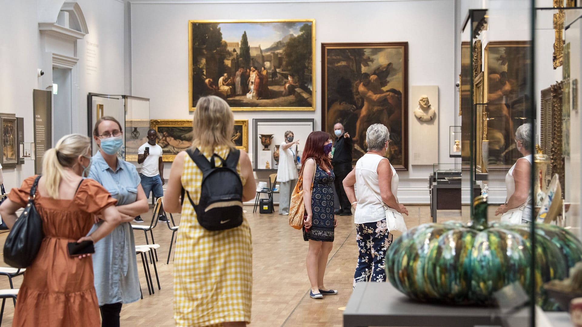 Visitors in art gallery